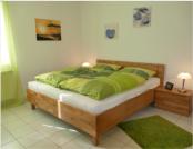 Gro�es Schlafzimmer mit sommerlich k�hler Ausstrahlung